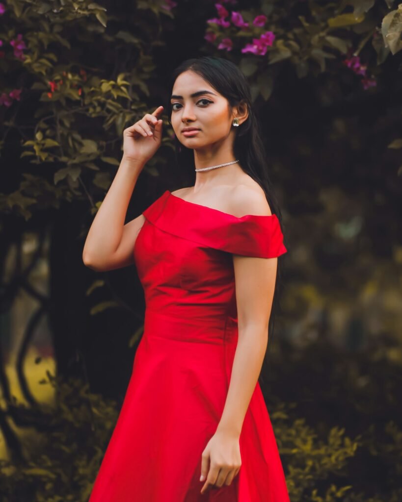 Woman in a festive red dress for a December holiday party