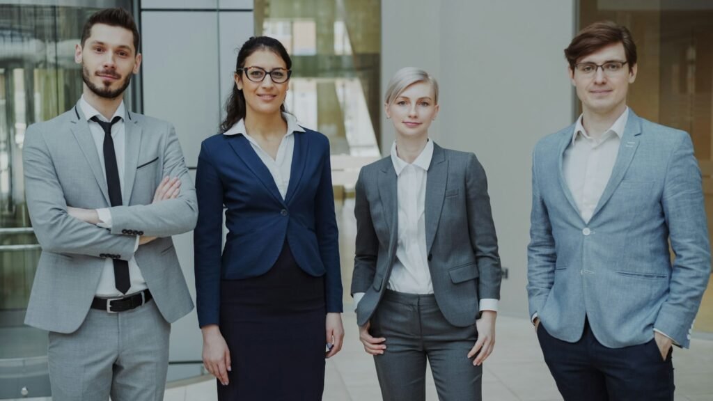 Business professionals in corporate and creative workplace attire