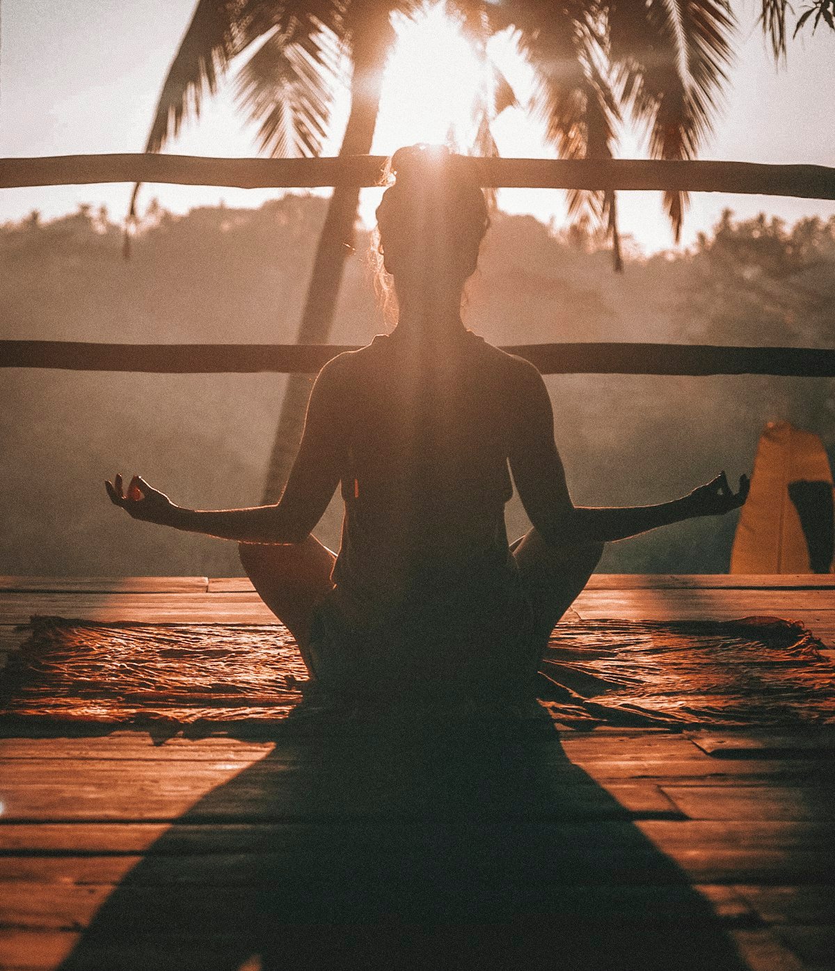 Woman stretching, one of the best morning routine ideas for a productive day